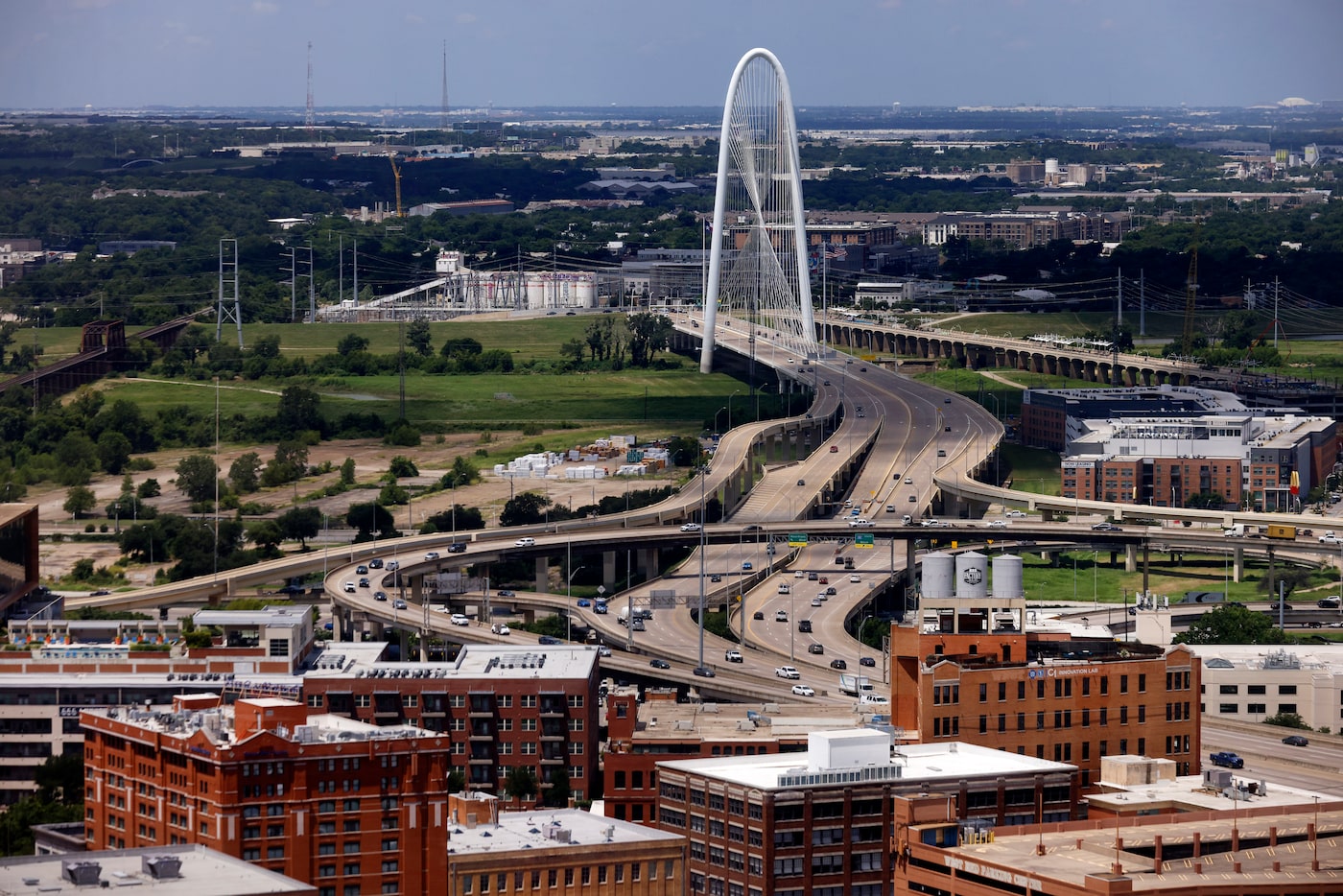 Woodall Rogers Freeway leads to the Margaret Hunt Hill Bridge that spans the Trinity River...