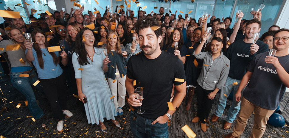 FieldPulse founder and CEO Gabe Pinchev (center) celebrates with his Dallas team after announcing the company’s $50 million Series C funding round, led by Fulcrum Equity Partners with Catalyst Investors joining as a new backer. [Photo: FieldPulse]
