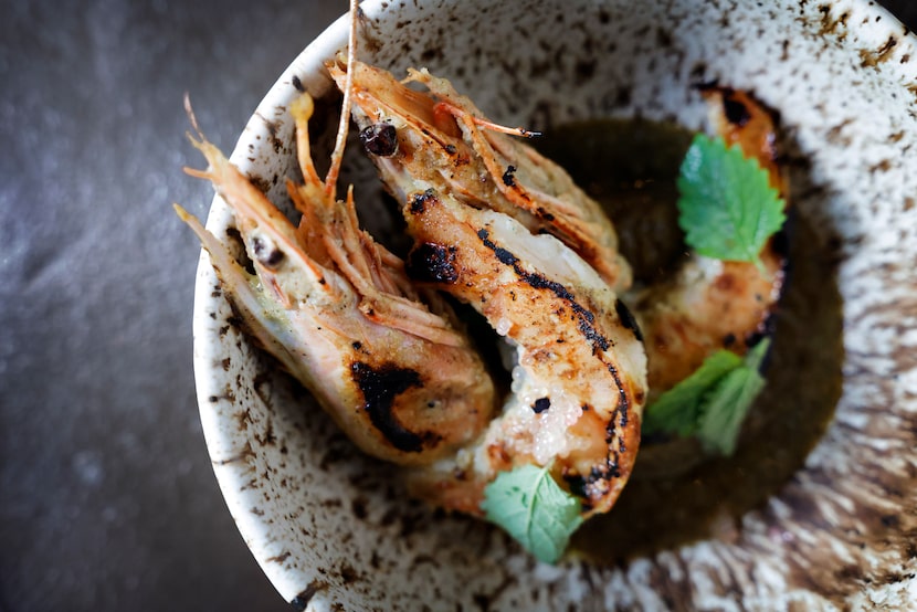 Jerk shrimp is among the 16-or-so courses at Sauvage in Dallas.