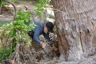 Former Navy SEAL James Jackson  looks for the spots along the Guadalupe River to search for...