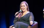 FILE- Author Rebecca Yarros discusses her new book "Onyx Storm" at The Town Hall on Friday, Jan. 24, 2025, in New York.