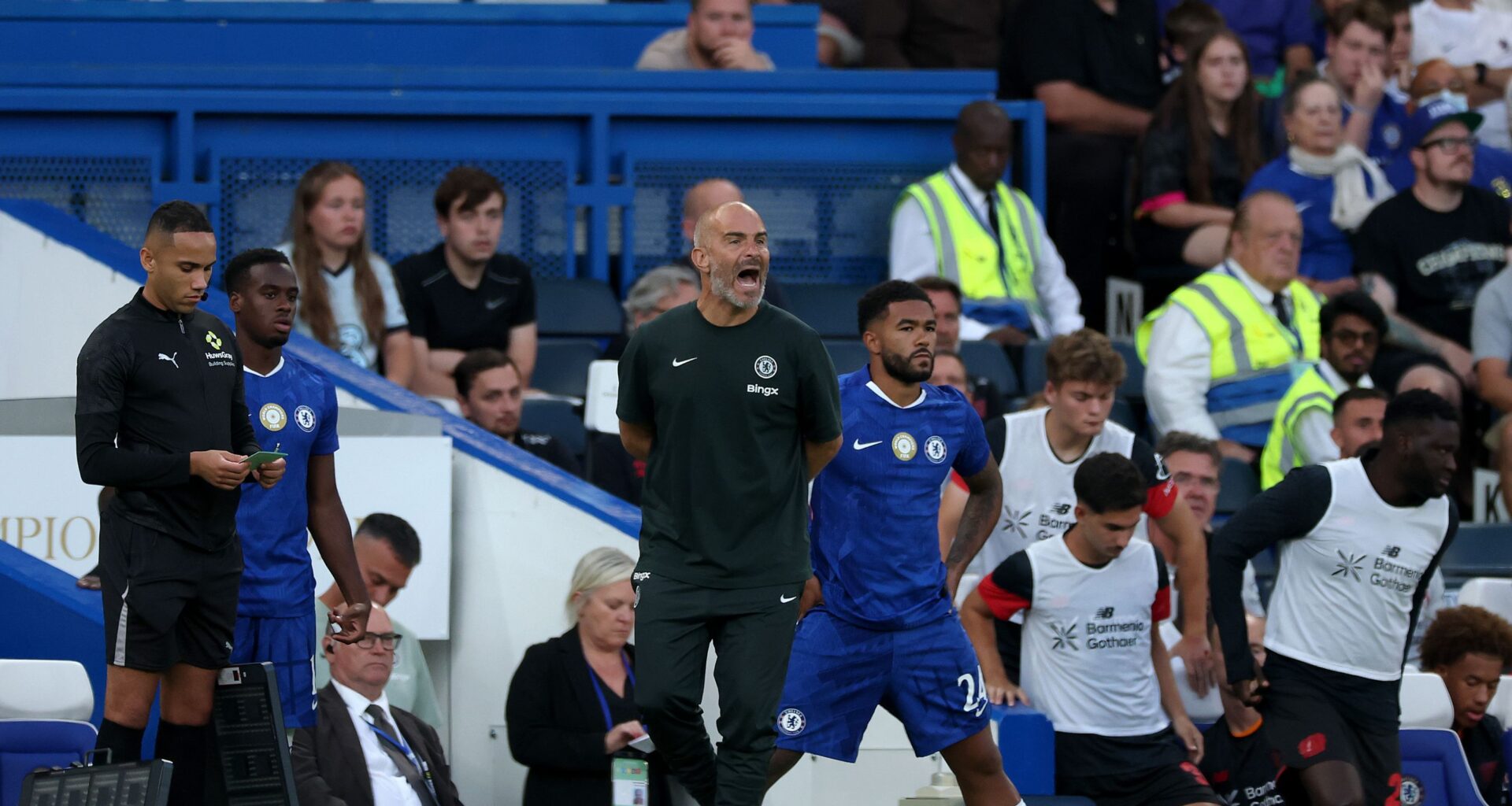 Enzo Maresca shouts on the touchline against Bayer Leverkusen.
