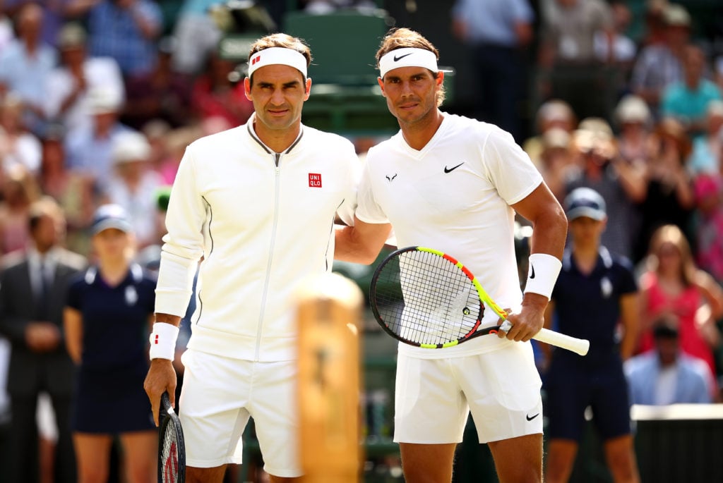 Roger Federer and Rafael Nadal pose for photos before their Wimbledon 2019 semi-final