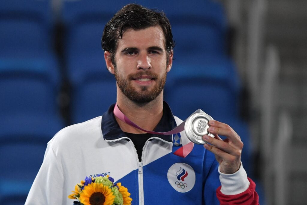 Karen Khachanov poses with his medal during the Tokyo 2020 Olympic men's singles tennis medal ceremony at the Ariake Tennis Park in Tokyo.
