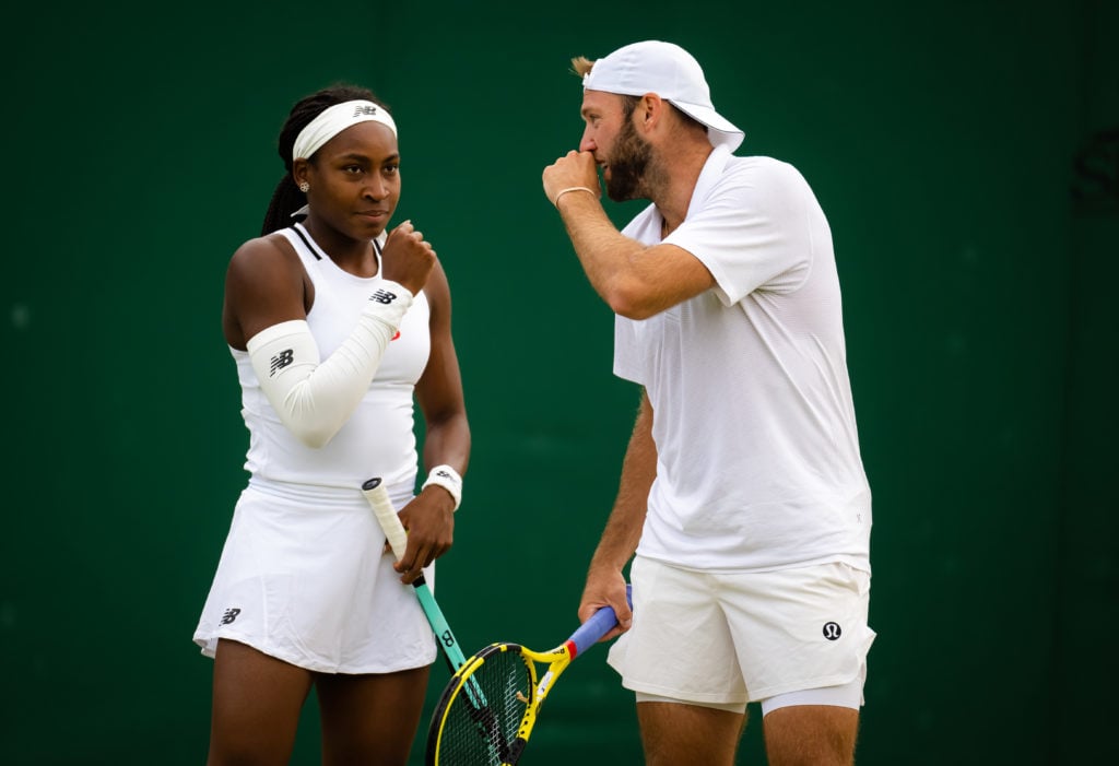 Coco Gauff speaks to Jack Sock during mixed doubles at The Championships - Wimbledon 2022