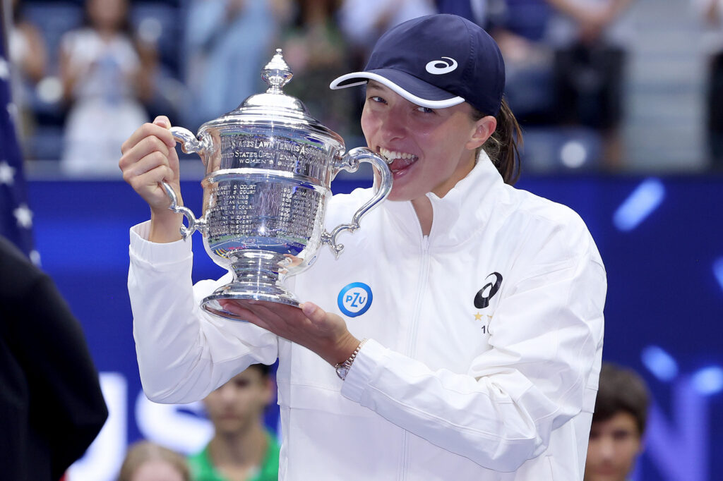 Iga Swiatek of Poland celebrates with the championship trophy after defeating Ons Jabeur of Tunisia during their Women’s Singles Final match on Day Thirteen of the 2022 US Open at USTA Billie Jean King National Tennis Center on September 10, 2022 in the Flushing neighborhood of the Queens borough of New York City.
