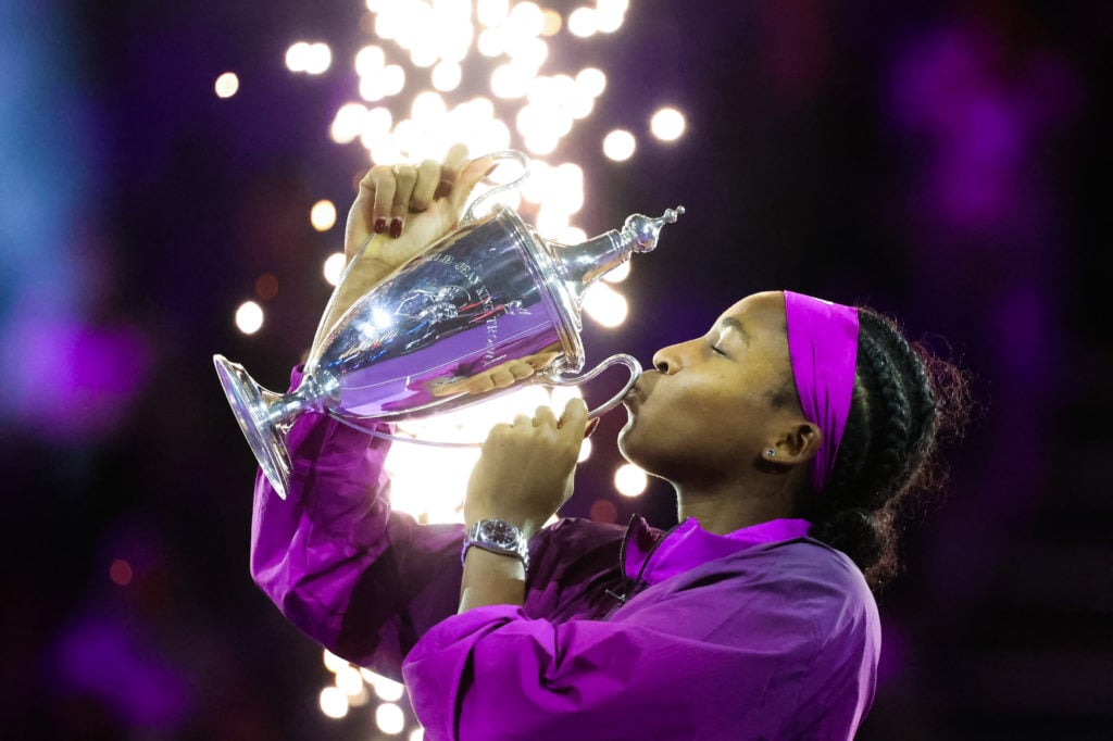 Coco Gauff celebrate with the trophy after winning the 2024 WTA Finals