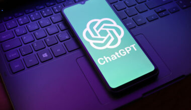The ChatGPT logo appears on a smartphone screen