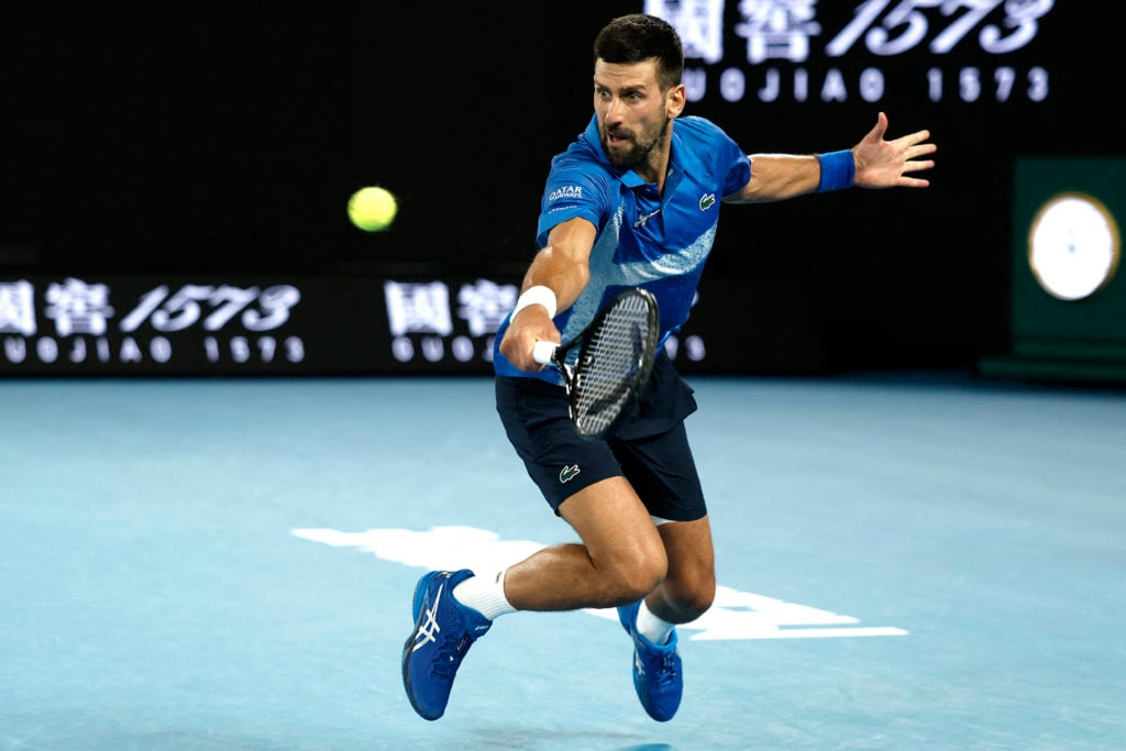 Novak Djokovic hits a backhand at the 2025 Australian Open