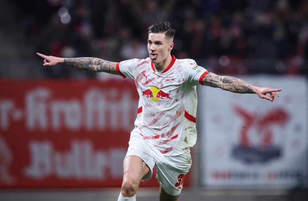 Benjamin Sesko celebrates after scoring for RB Leipzig.