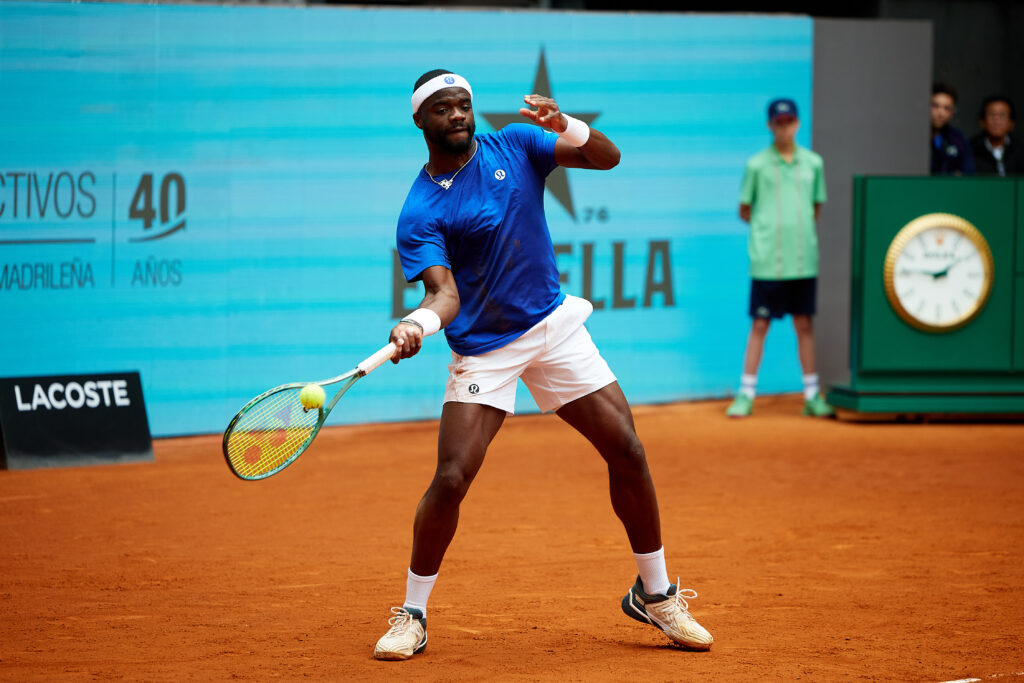 Frances Tiafoe hits a forehand at the 2025 Mutua Madrid Open