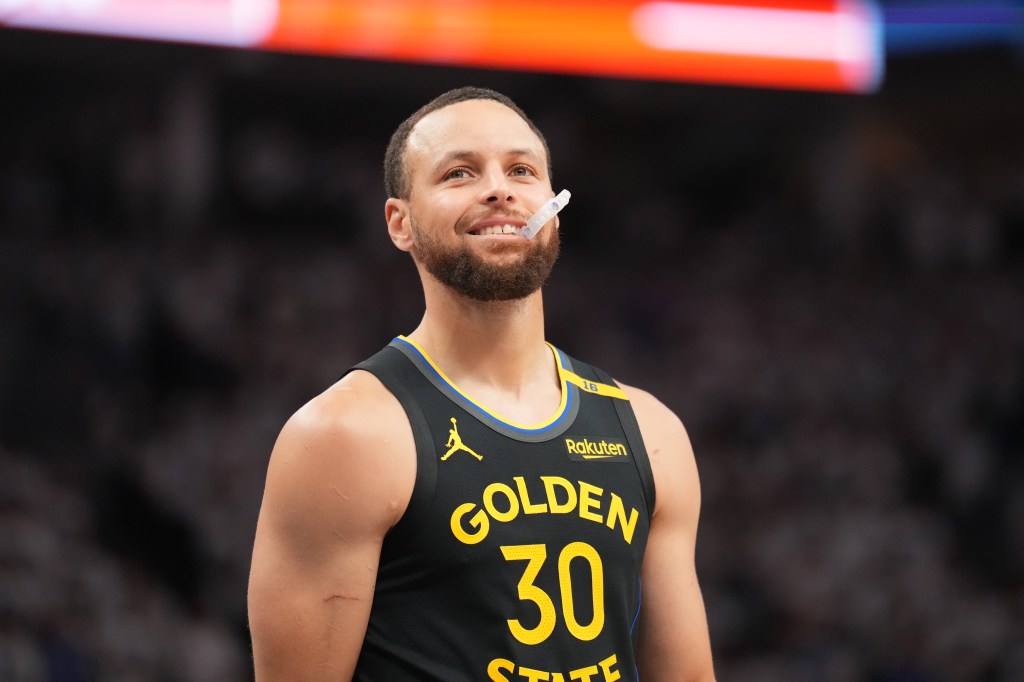 Stephen Curry #30 of the Golden State Warriors smiles before the game against the Minnesota Timberwolves during Round 2 Game 1 of the 2025 NBA Playoffs on May 6, 2025 at Target Center in Minneapolis, Minnesota.