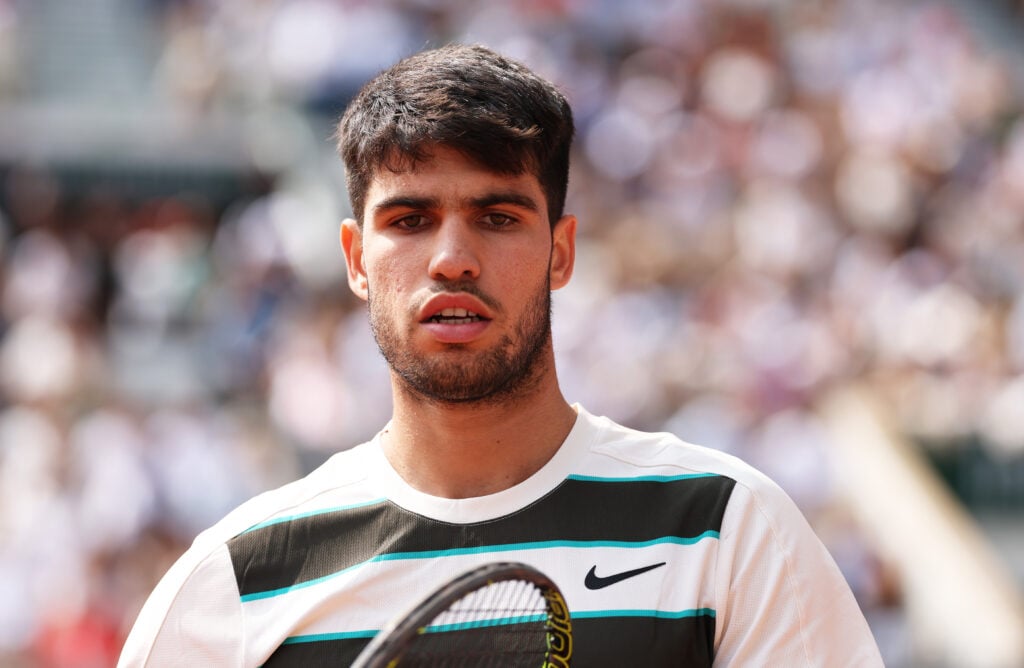 Carlos Alcaraz of Spain shows his dejection against Jannik Sinner of Italy during the Men's Singles Final match on Day Fifteen of the 2025 French Open at Roland Garros.