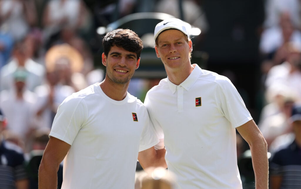 Carlos Alcaraz and Jannik Sinner pose for a photo together before the 2025 Wimbledon final