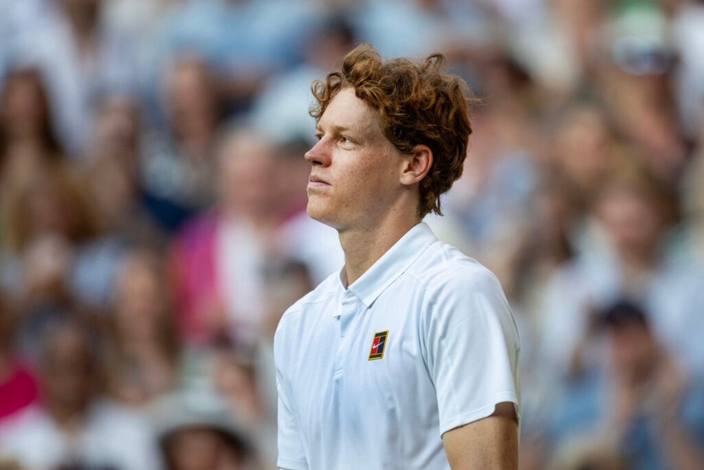Jannik Sinner looks on after winning Wimbledon in 2025