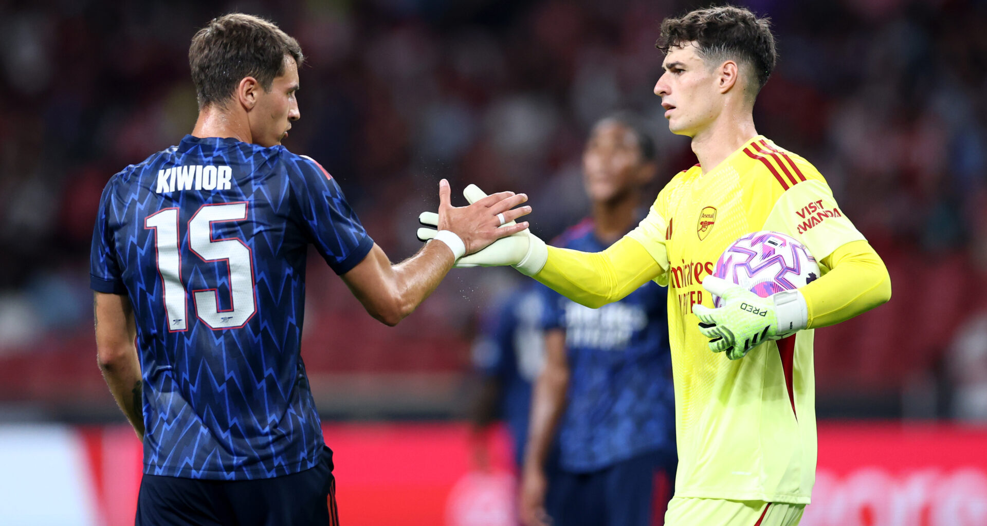 Jakub Kiwior of Arsenal shakes hands with teammate Kepa Arrizabalaga during the Pre-Season Friendly match between Arsenal FC and AC Milan at Nation...