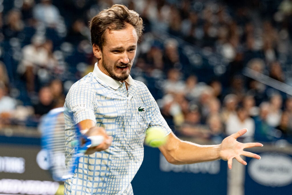 Daniil Medvedev returns the ball to Alexei Popyrin at the 2025 Canadian Open