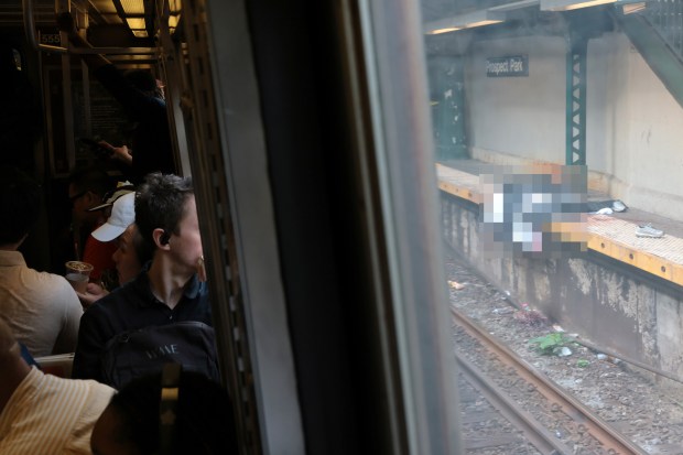 The body of a man hit by a train is seen on the platform at the Prospect Park subway stop on July 30, 2025 in Brooklyn, New York. (Photo by Michael M. Santiago/Getty Images)