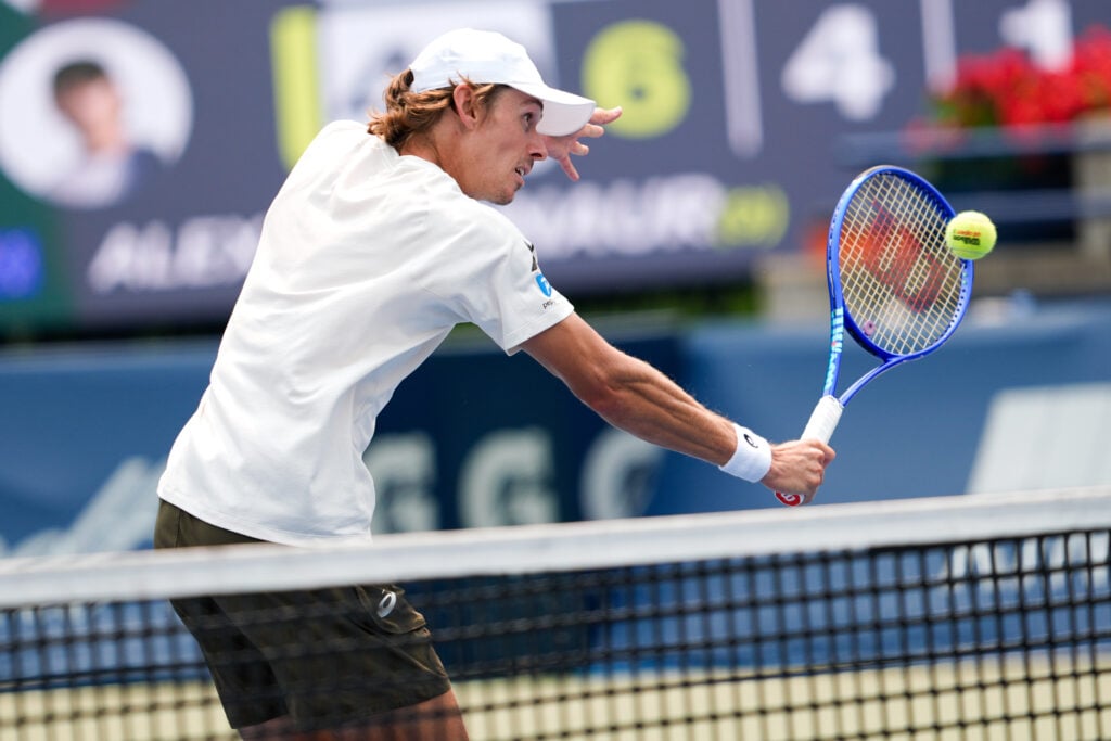 Alex de Minaur hits a volley at the National Bank Open 2025