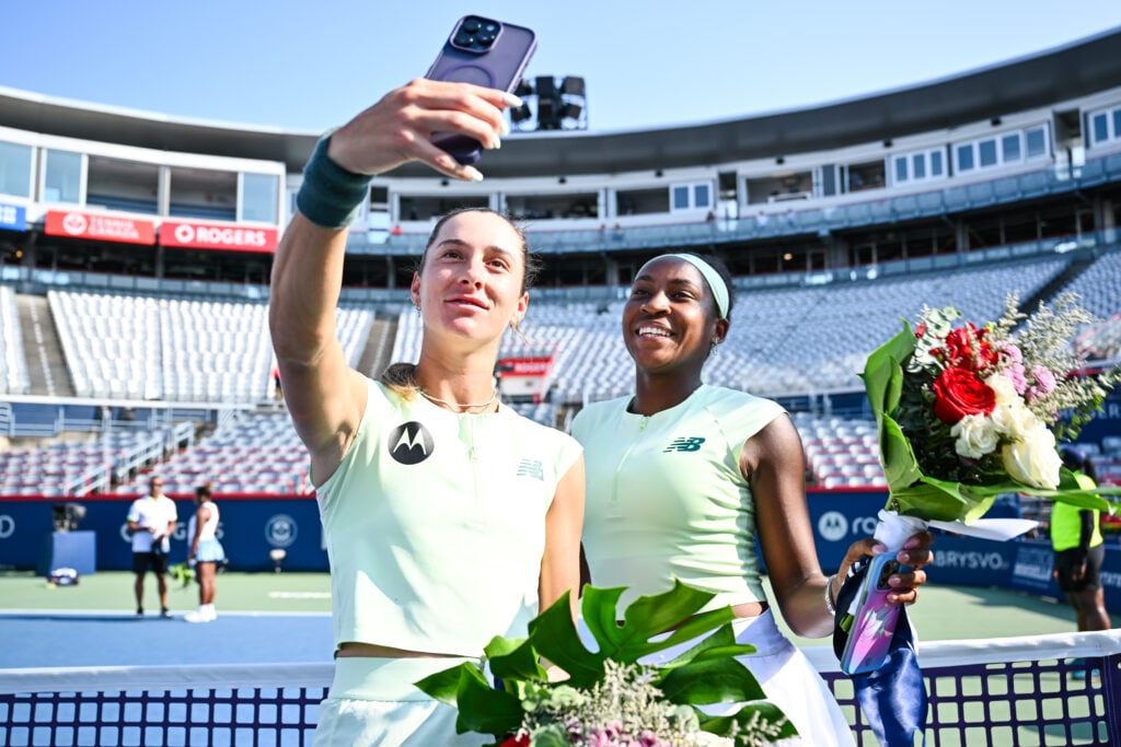 Coco Gauff and McCartney Kessler take a selfie after winning the 2025 WTA 1000 National Bank Open doubles title