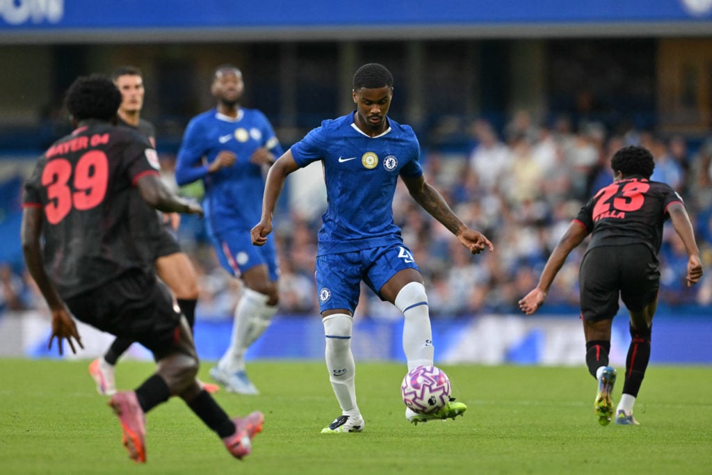 Jorrel Hato playing for Chelsea in a pre-season match against Bayer Leverkusen at Stamford Bridge.