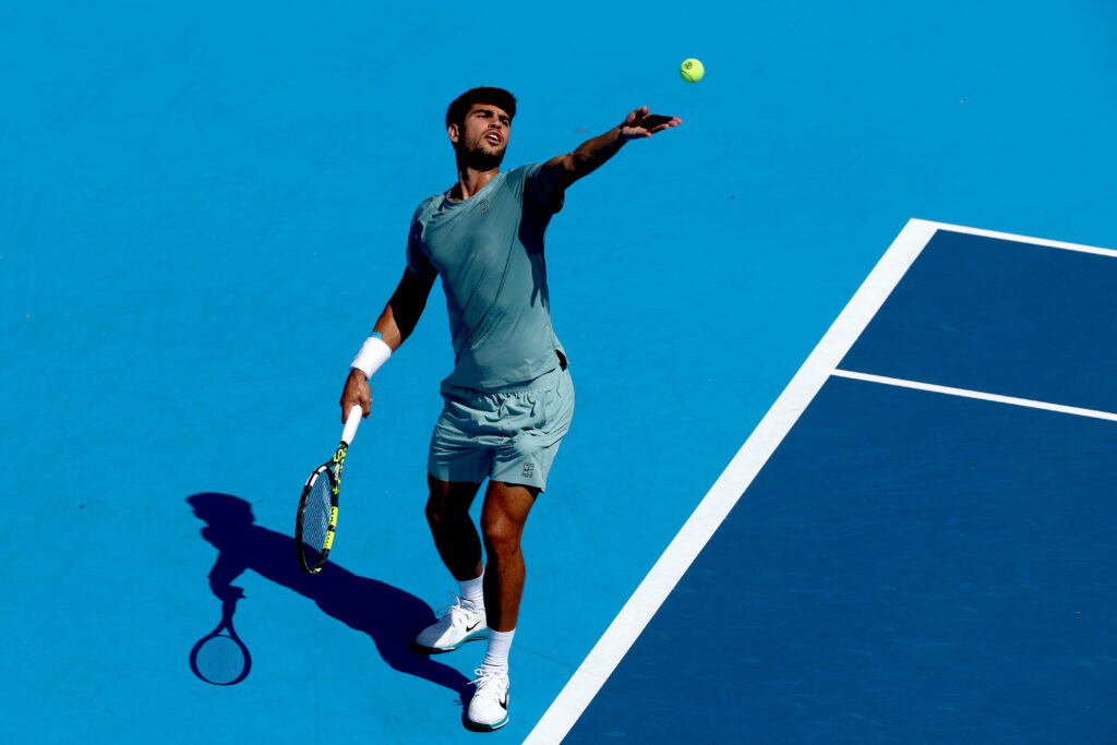 Carlos Alcaraz of Spain serves to Jannik Sinner of Italy during the men's final of the Cincinnati Open at Lindner Family Tennis Center on August 18, 2025 in Mason, Ohio.