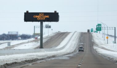 A sign warns of icy conditions on Interstate Highway 35 on February 18, 2021, in Killeen, Texas.