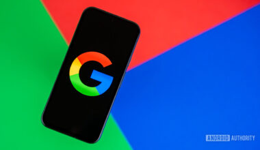 Google or Google Search logo on smartphone, with colorful background stock photo (2)