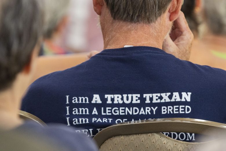A member of True Texas Project wears an organization T-shirt during a monthly meeting at the Texas Star Golf Course in Euless. Mary Abby Goss/Fort Worth Report.