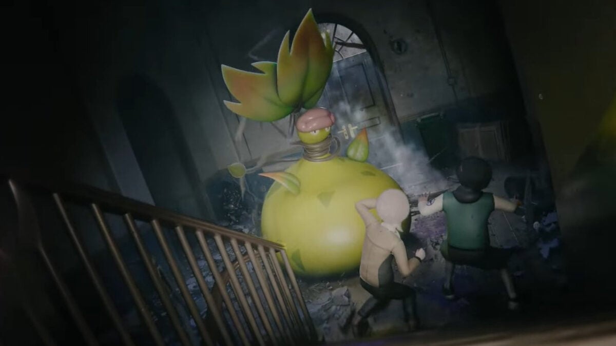 Mega Victreebel towers over two people