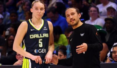 Dallas Wings coach Chris Koclanes talks with rookie guard Paige Bueckers during a game earlier this season. Koclanes is in his first season as a WNBA head coach, but he has ties to Philly hoops.