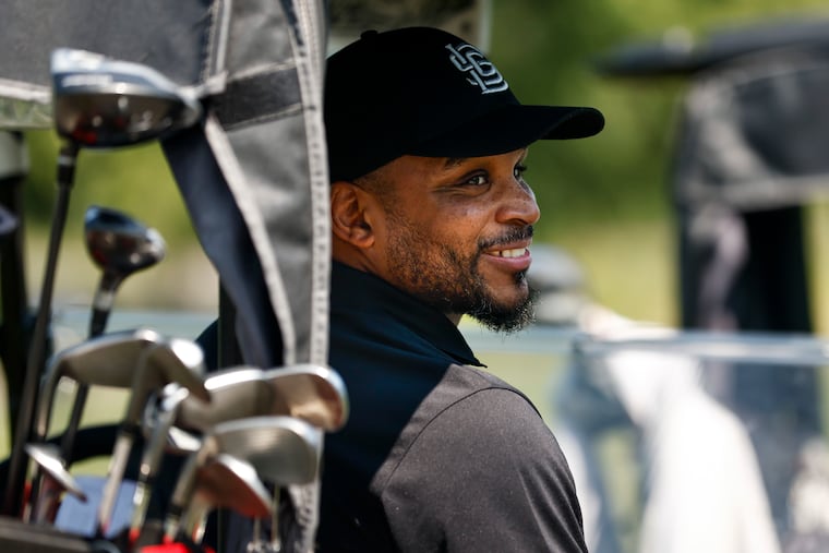 Jameer Nelson, Sixers assistant general manager, smiles from his golf cart during the Jefferson Health APGA Classic Pro-Am at the 1912 Club on Sunday.
