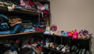 A closet with donated and bought items at Interfaith’s Hawthorne Veteran and Family Resource Center in Escondido on Thursday, Aug. 1, 2024. / Ariana Drehsler for Voice of San Diego