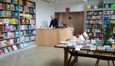 Philip Lorish at the counter of his bookstore ‘Commerce Street Books’