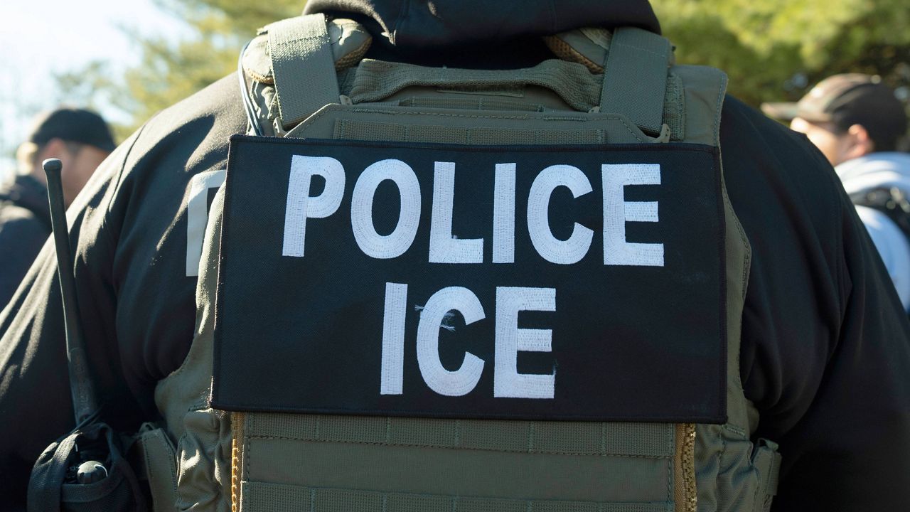A U.S. Immigration and Customs Enforcement officer listens during a briefing, Jan. 27, 2025, in Silver Spring, Md. (AP Photo/Alex Brandon)