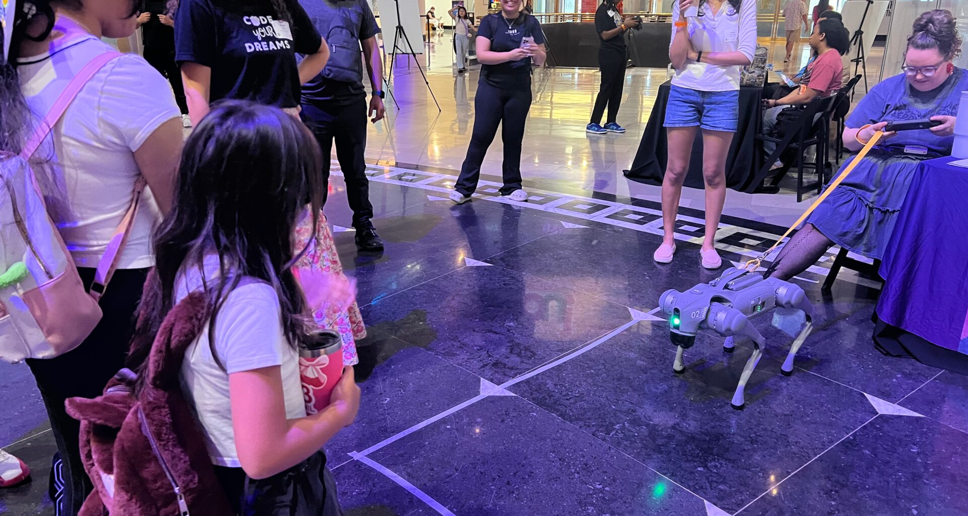 A group watches "Benny" the robot at the Museum of Science and Industry