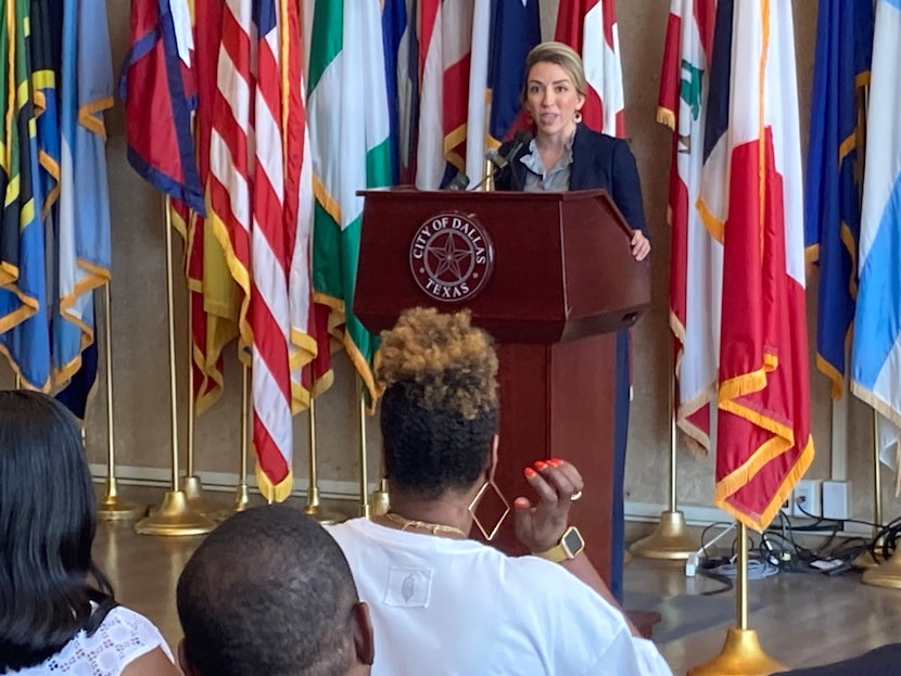 Rev. Victoria Robb Powers, senior pastor at Royal Lane Baptist Church, speaks to a crowd at...