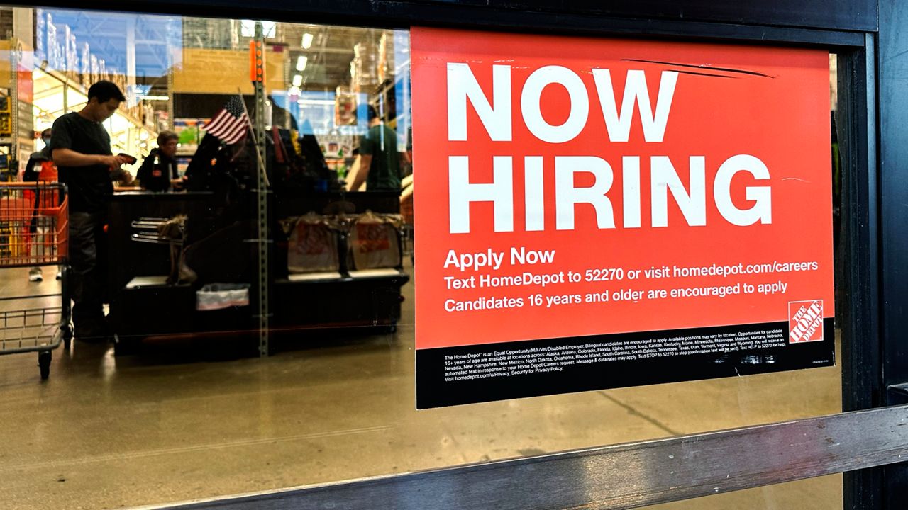 A hiring sign is displayed at a retail store in Mount Prospect, Ill., Saturday, Nov. 2, 2024. (AP Photo/Nam Y. Huh, File)