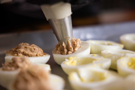 Never fear if you don't have a piping bag and an icing tip: You can transfer the filling...