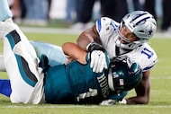 Dallas Cowboys linebacker Micah Parsons (11) sacks Philadelphia Eagles quarterback Jalen...