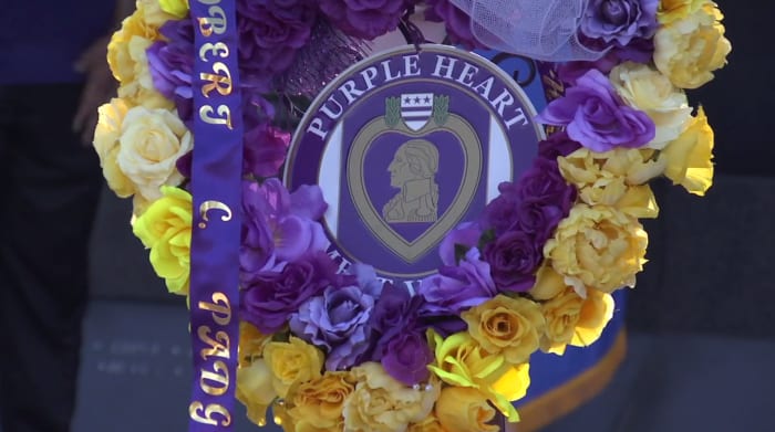 Community invited to honor fallen soldiers as part of Purple Heart Day ceremony near Veterans Memorial Wall