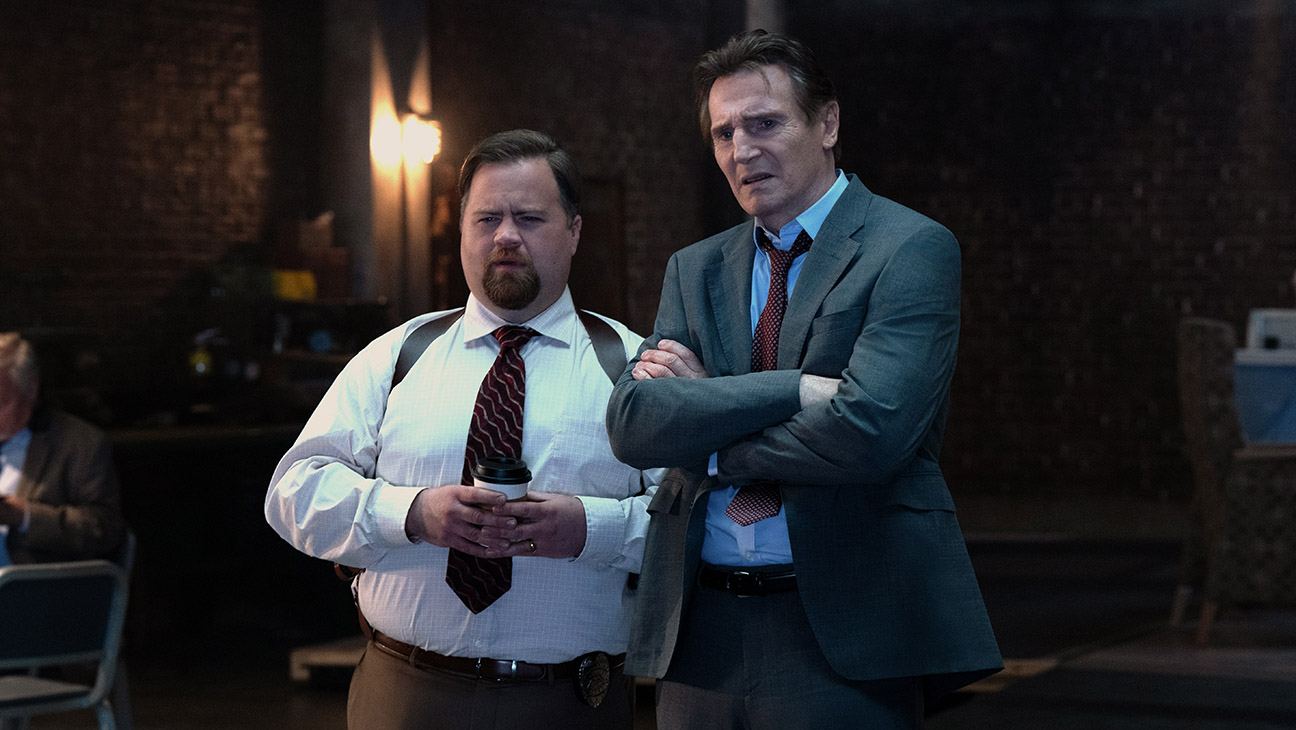 Paul Walter Hauser plays Ed Hocken Jr. and Liam Neeson plays Frank Drebin Jr. in The Naked Gun from Paramount Pictures.