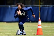 Dallas Cowboys running back Malik Davis put in some work following a non-padded training...