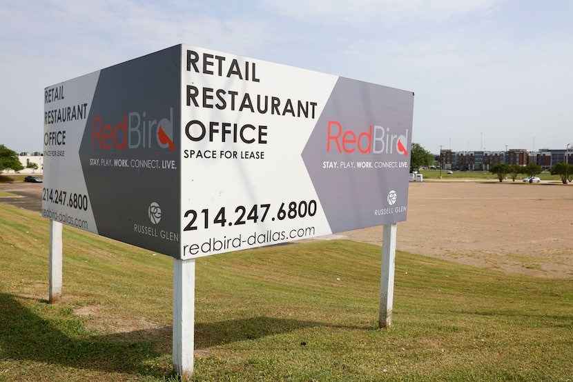 Signs showed development coming in RedBird to the east of S. Westmoreland Road, Friday,...