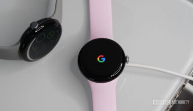A Pixel Watch 3 charges on a Watch 2 charger.