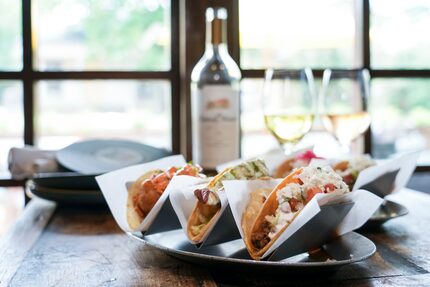 For $50, Taco y Vino sells six tacos and a bottle of wine.