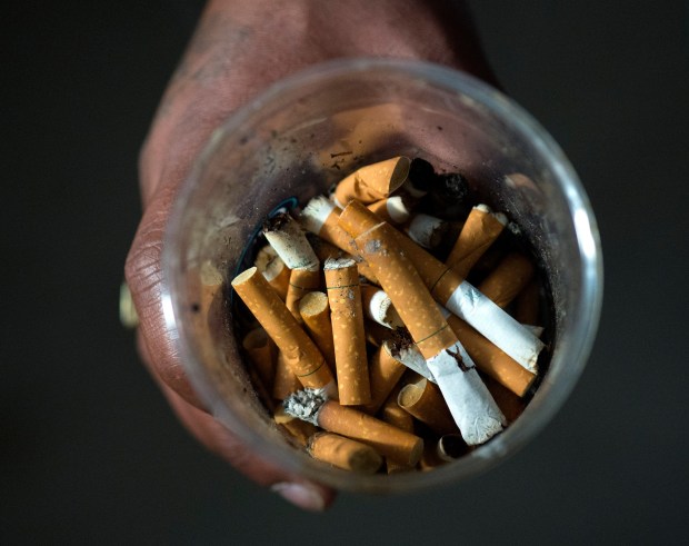 The Riverside County Black Chamber of Commerce is launching a campaign to persuade Inland Empire cities with large black populations -- among them Riverside, San Bernardino, Moreno Valley and Perris -- to ban sales of menthol cigarettes within their boundaries. Will McCoy, 36, of Riverside, Calif. and his wife are menthol smokers. Their menthol cigarette butts are in the garage. Photographed on Friday April 12, 2019. (Photo by Cindy Yamanaka, The Press-Enterprise/SCNG)