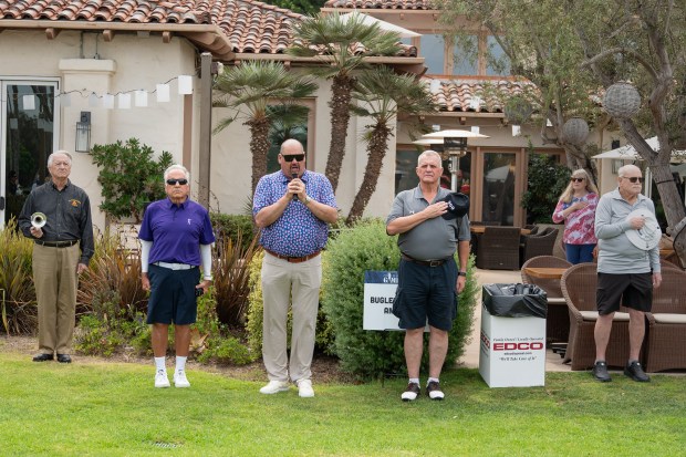 Christopher Lesson sings the National Anthem at Operation Game On...