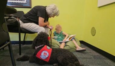 Kids can read to dogs to build literacy skills in Phoenix...