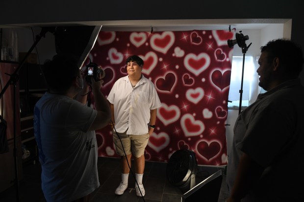 Ally Garber poses for pictures at MiSELA, an LGBT youth...